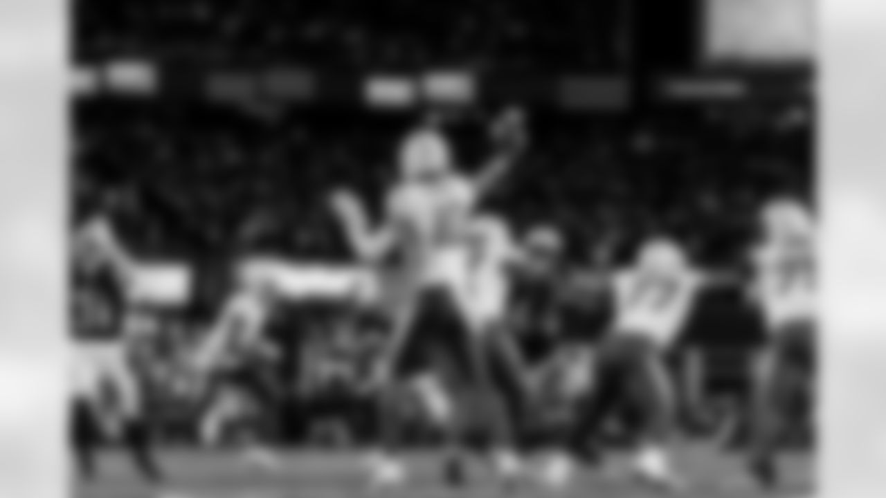 Check out the best shots from the Chargers Wild Card matchup against the Patriots!