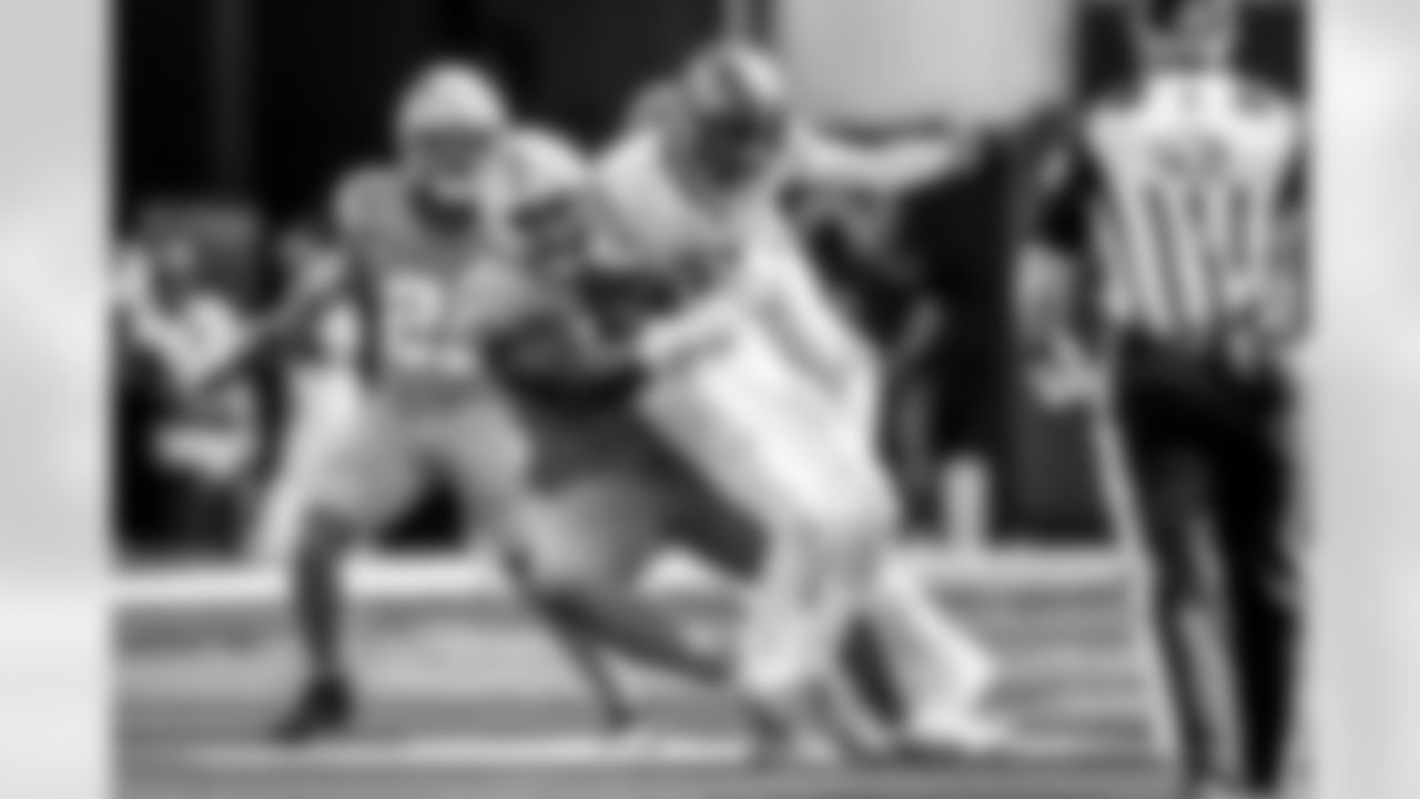 Take a look back at the Chargers Week 5 matchup with the Commanders in monochrome!