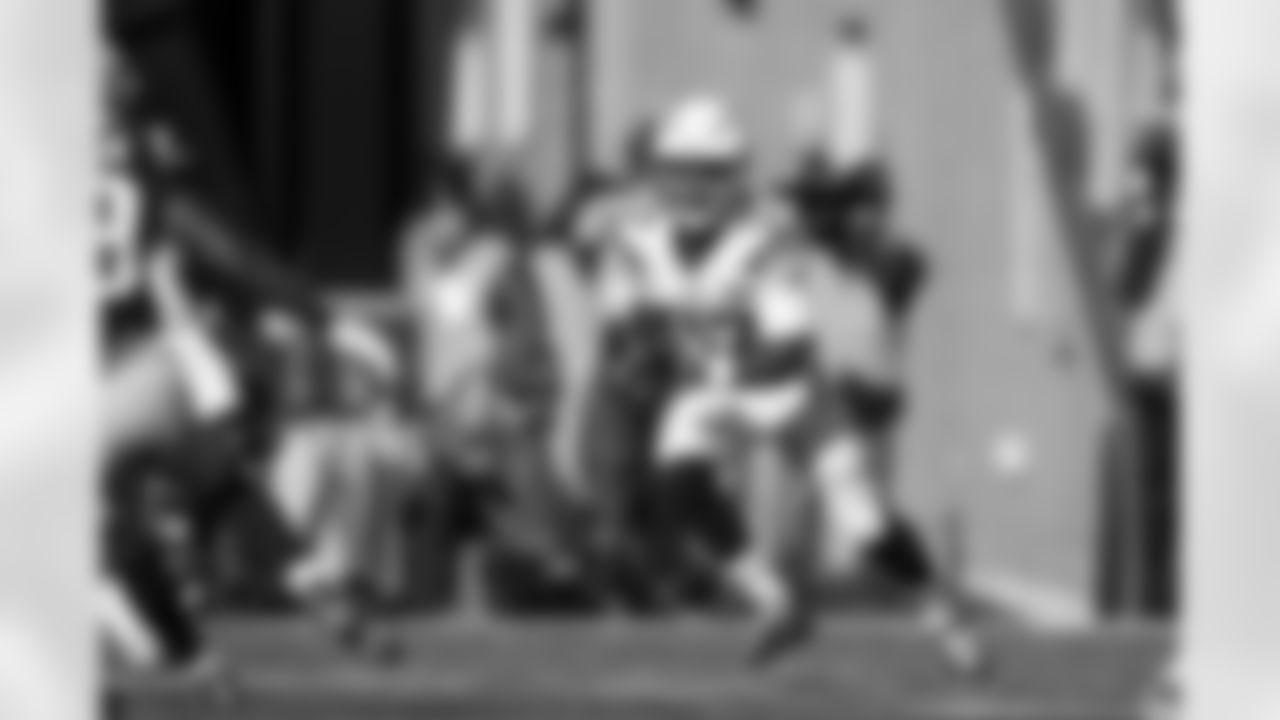 Relive the Chargers' postseason appearances through images from playoff games, highlighting the moments that defined the team in the NFL playoffs.