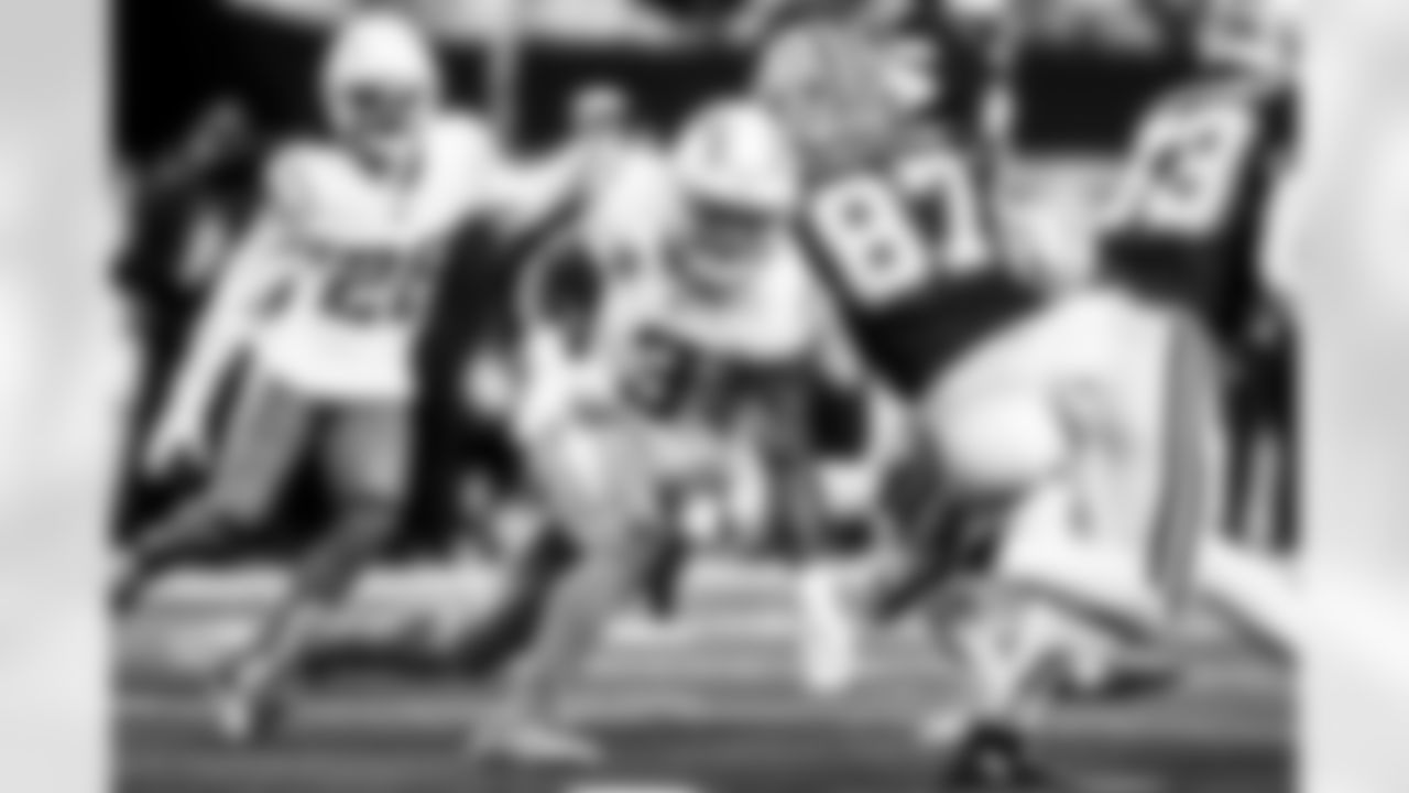 Take a look back at the Chargers Week 16 matchup with the Cowboys in monochrome.