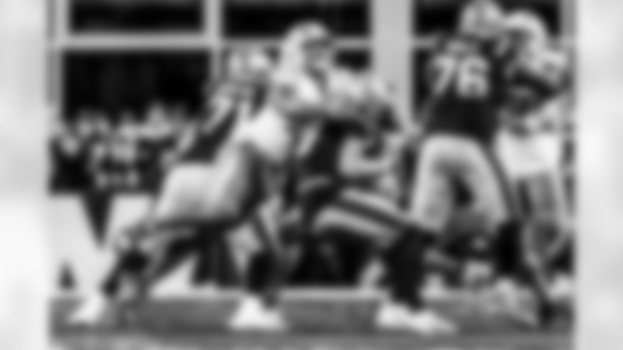 Take a look back at the Chargers Wild Card matchup with the Patriots in monochrome.