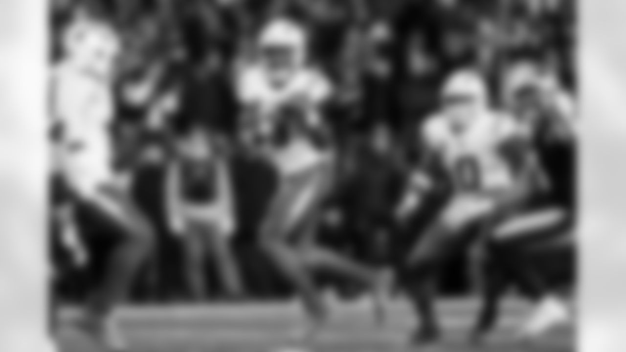 S Derwin James Jr. (3) and LB Daiyan Henley (0)