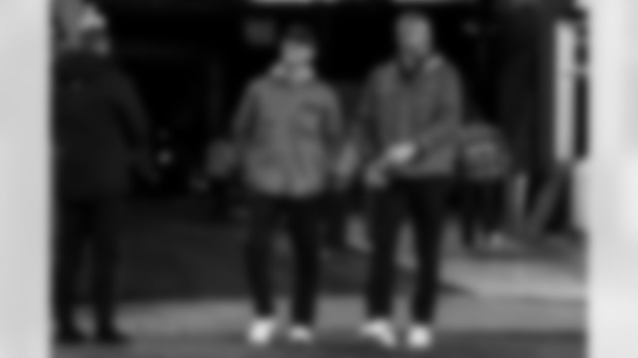 Head Coach Jim Harbaugh and Defensive Line Coach Mike Elston