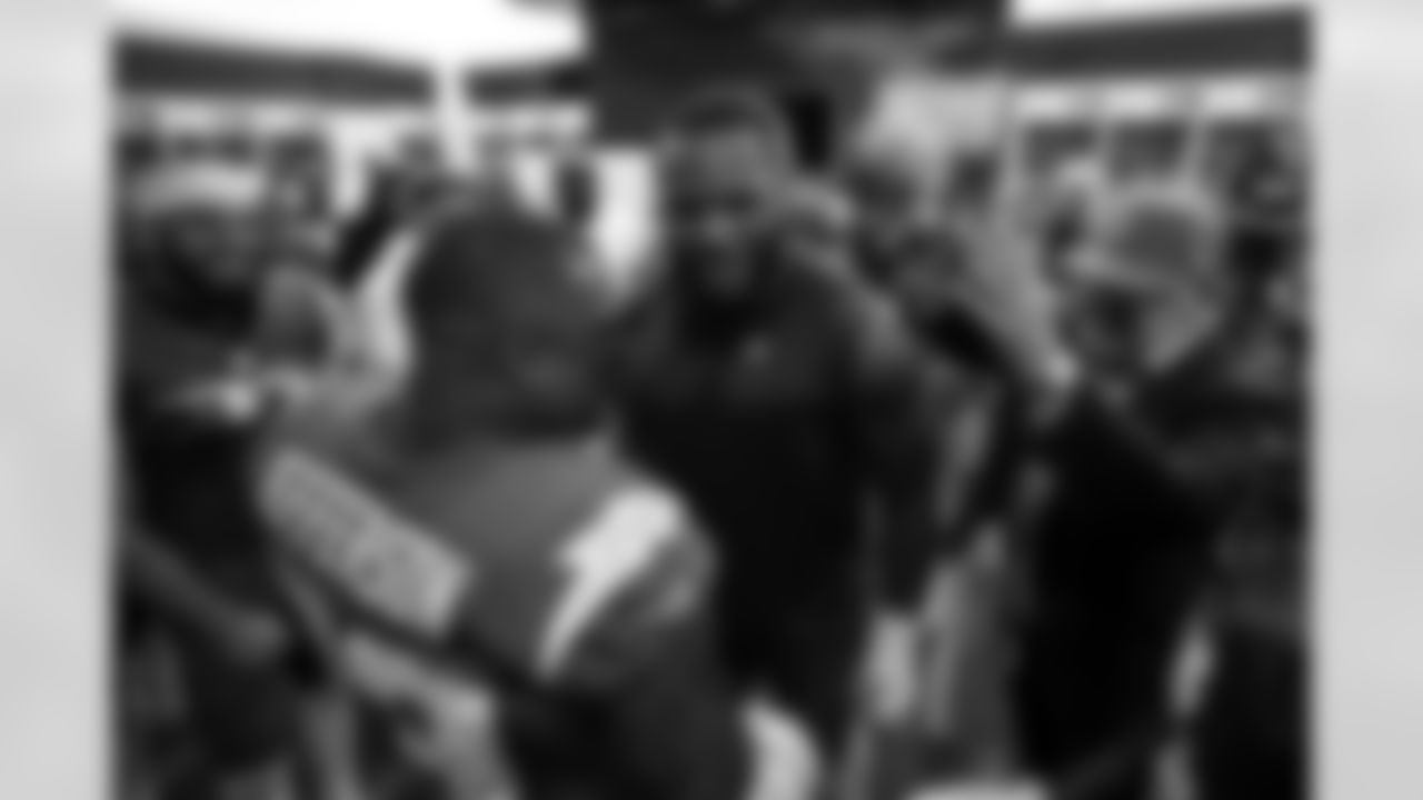 S Tony Jefferson (23), DL Da'Shawn Hand (91) and General Manager Joe Hortiz