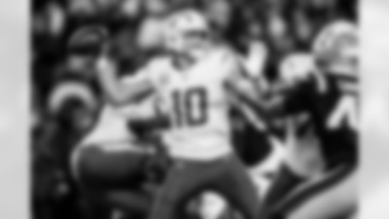 Check out the best shots from the Chargers Wild Card matchup against the Patriots!