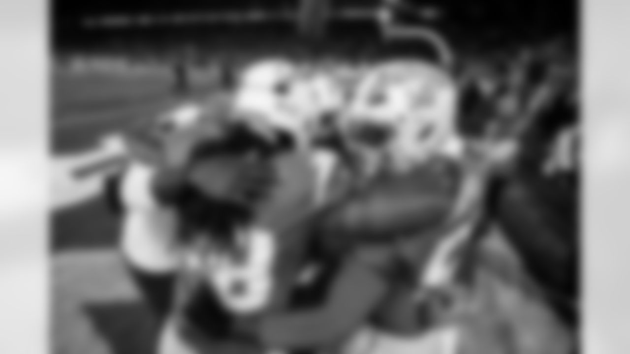 OLB Caleb Murphy (50) and OLB Bud Dupree (48)