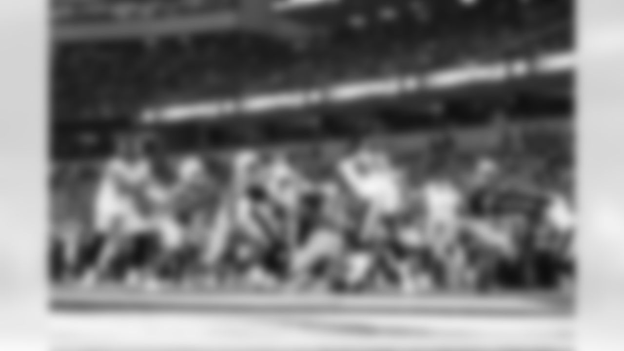 DT Jamaree Caldwell (99) and OLB Khalil Mack (52)