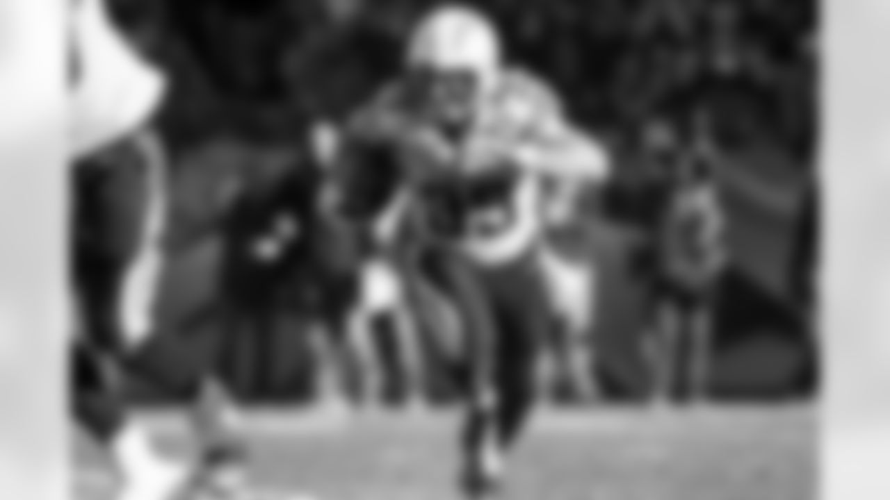 Relive the Chargers' postseason appearances through images from playoff games, highlighting the moments that defined the team in the NFL playoffs.