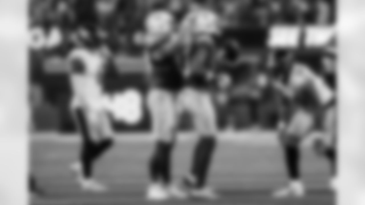 DL Scott Matlock (44) and WR Keenan Allen (13)