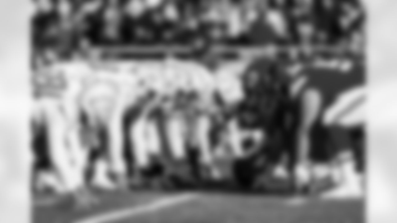 DL Otito Ogbonnia (93) and DL Justin Eboigbe (92)