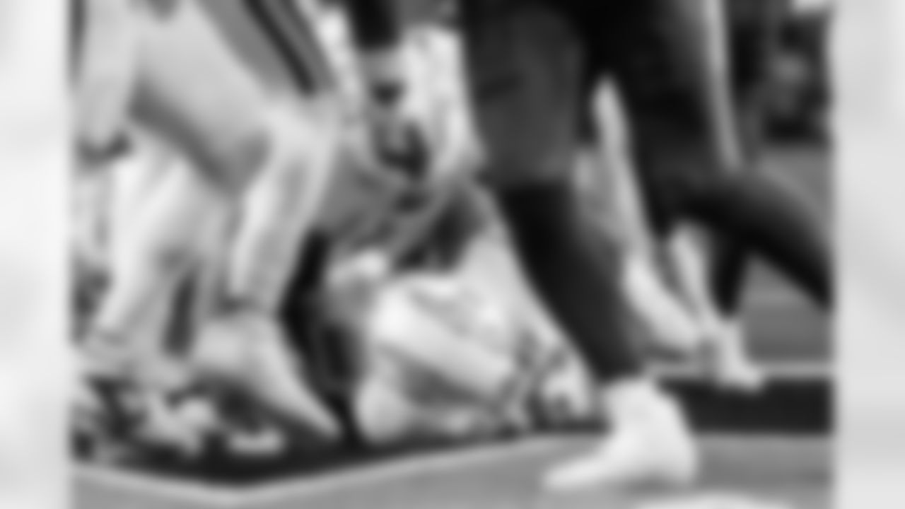 DL Scott Matlock (44) and QB Justin Herbert (10)