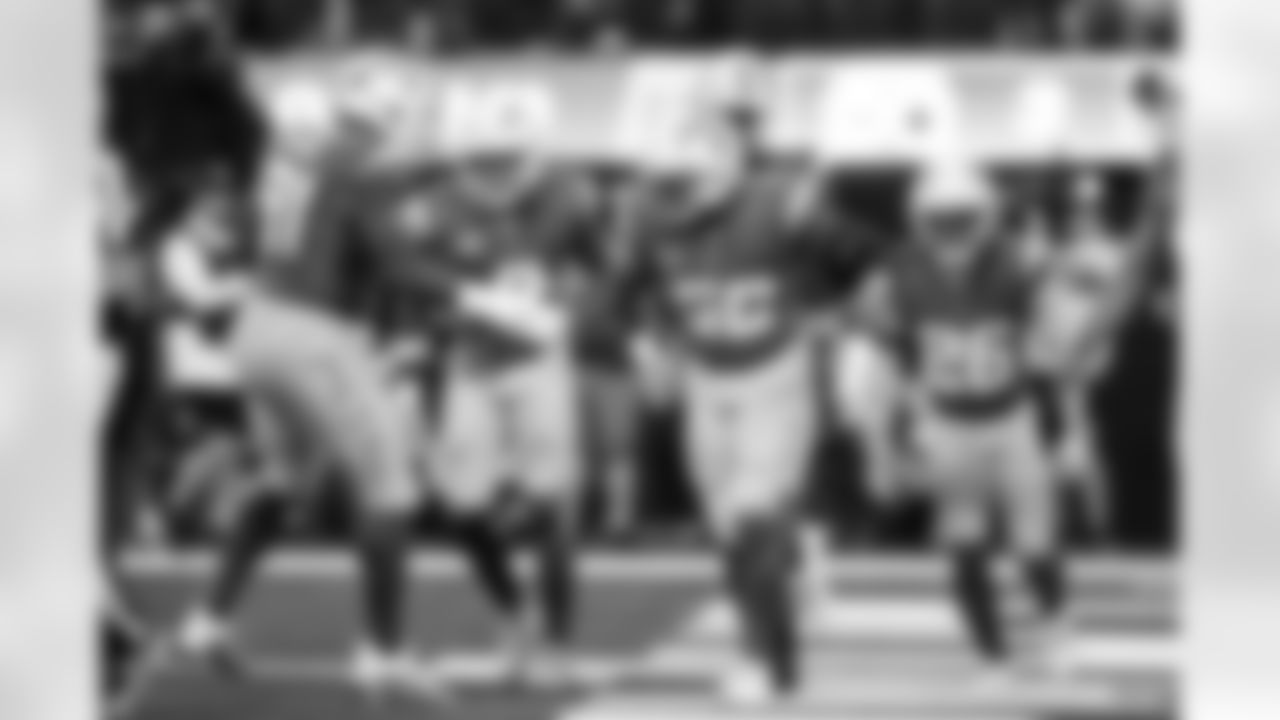 DL Da'Shawn Hand (91), LB Daiyan Henley (0), OLB Khalil Mack (52) and CB Donte Jackson (26)