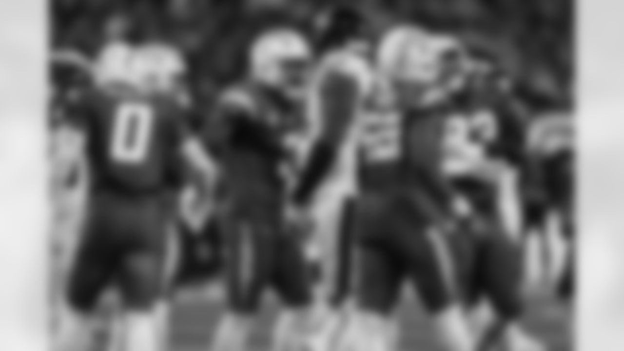 S Derwin James Jr. (3) and OLB Khalil Mack (52)