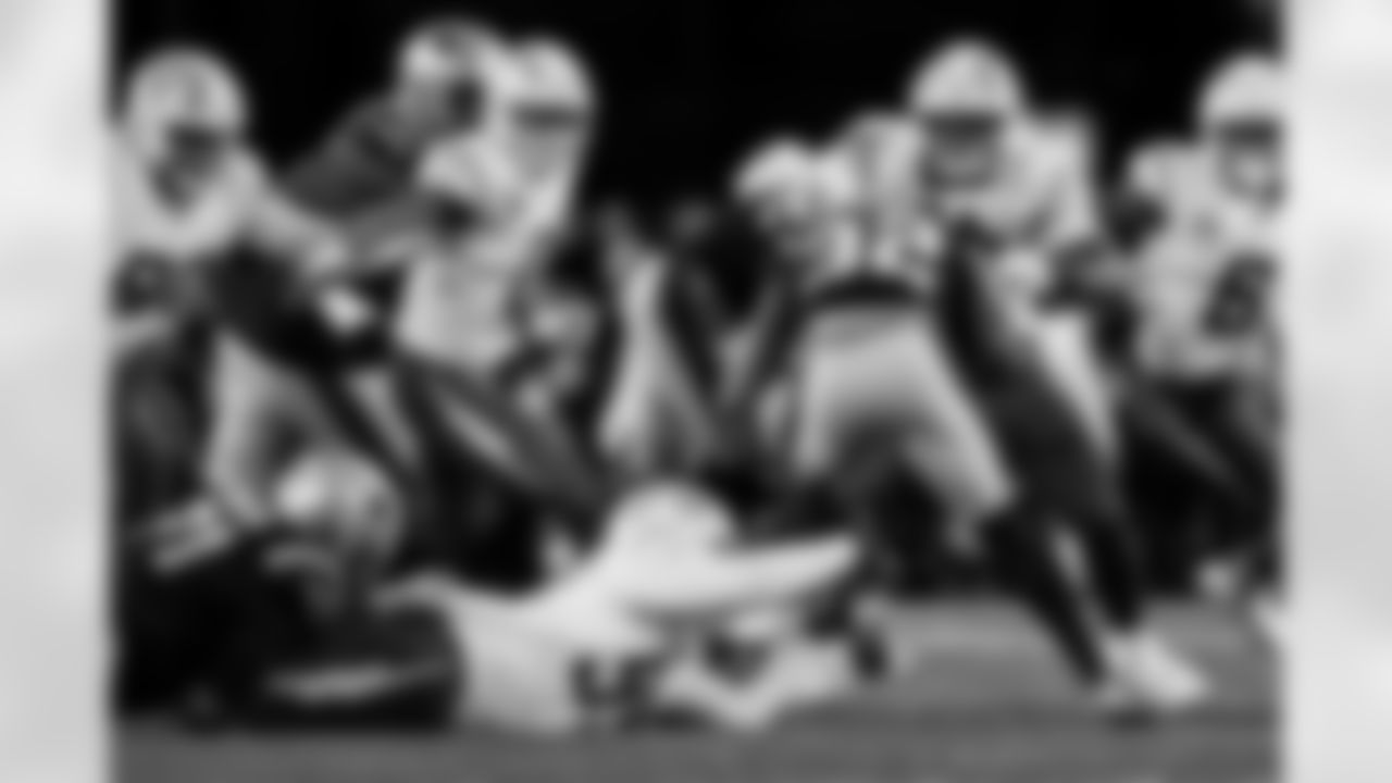 Check out the best shots from the Chargers Wild Card matchup against the Patriots!