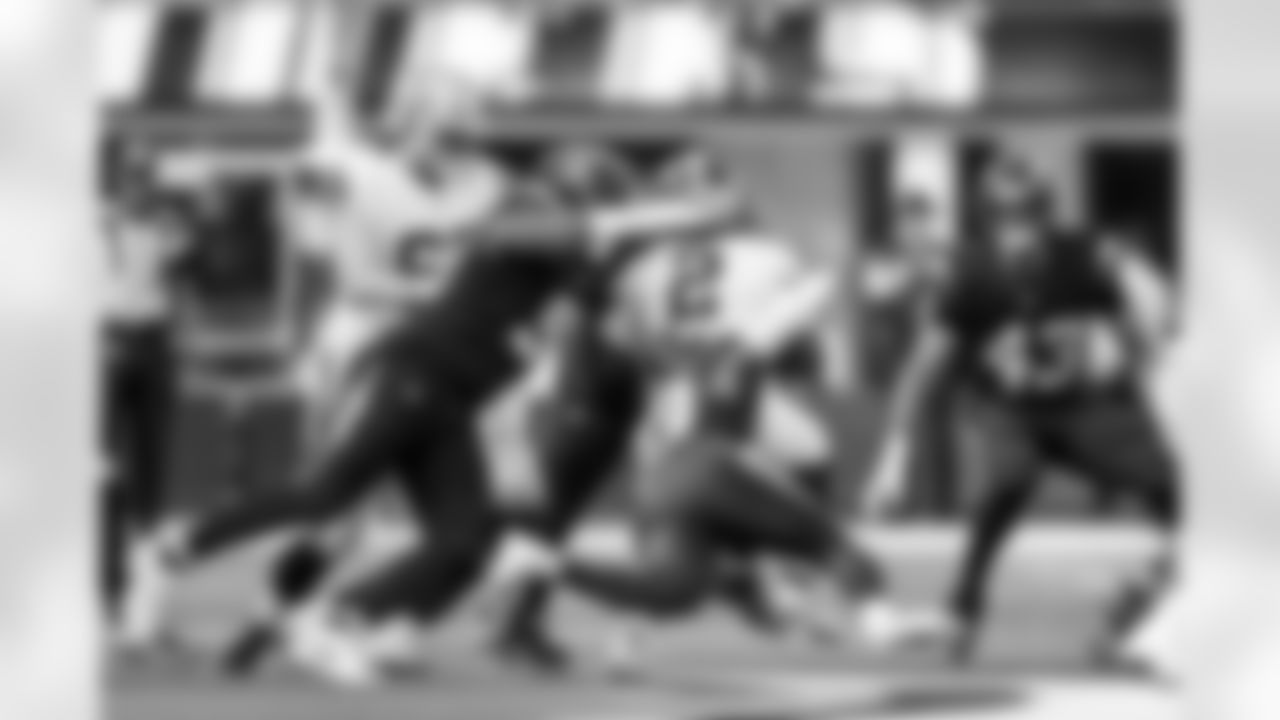 DL Da'Shawn Hand (91), S Tony Jefferson (23) and LB Troy Dye (43)