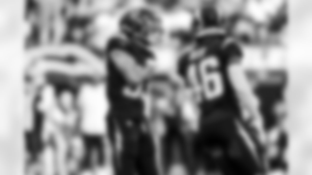 DB Deane Leonard (33) and CB Nikko Reed (46)