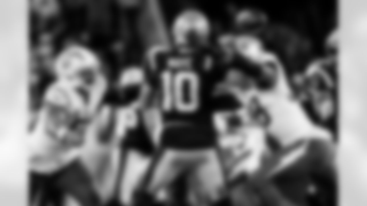 Check out the best shots from the Chargers Wild Card matchup against the Patriots!