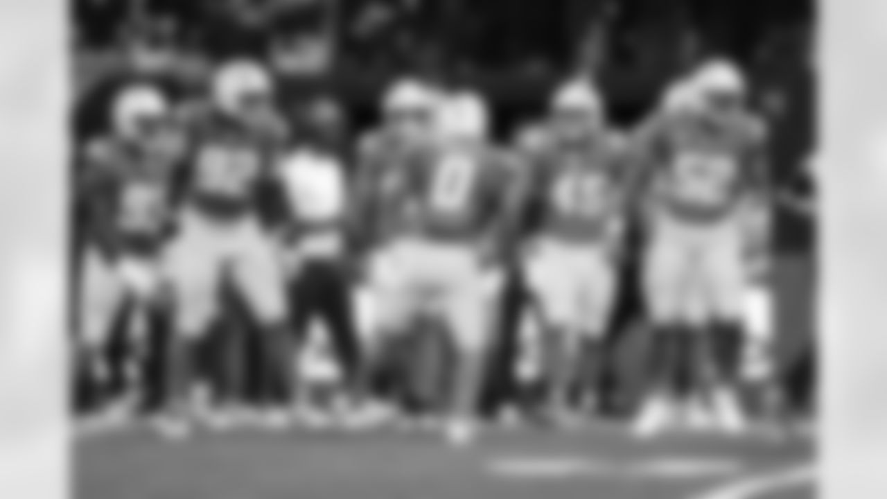 DL Otito Ogbonnia (93), DL Justin Eboigbe (92), LB Daiyan Henley (0), OLB Tuli Tuipulotu (45) and OLB Khalil Mack (52)