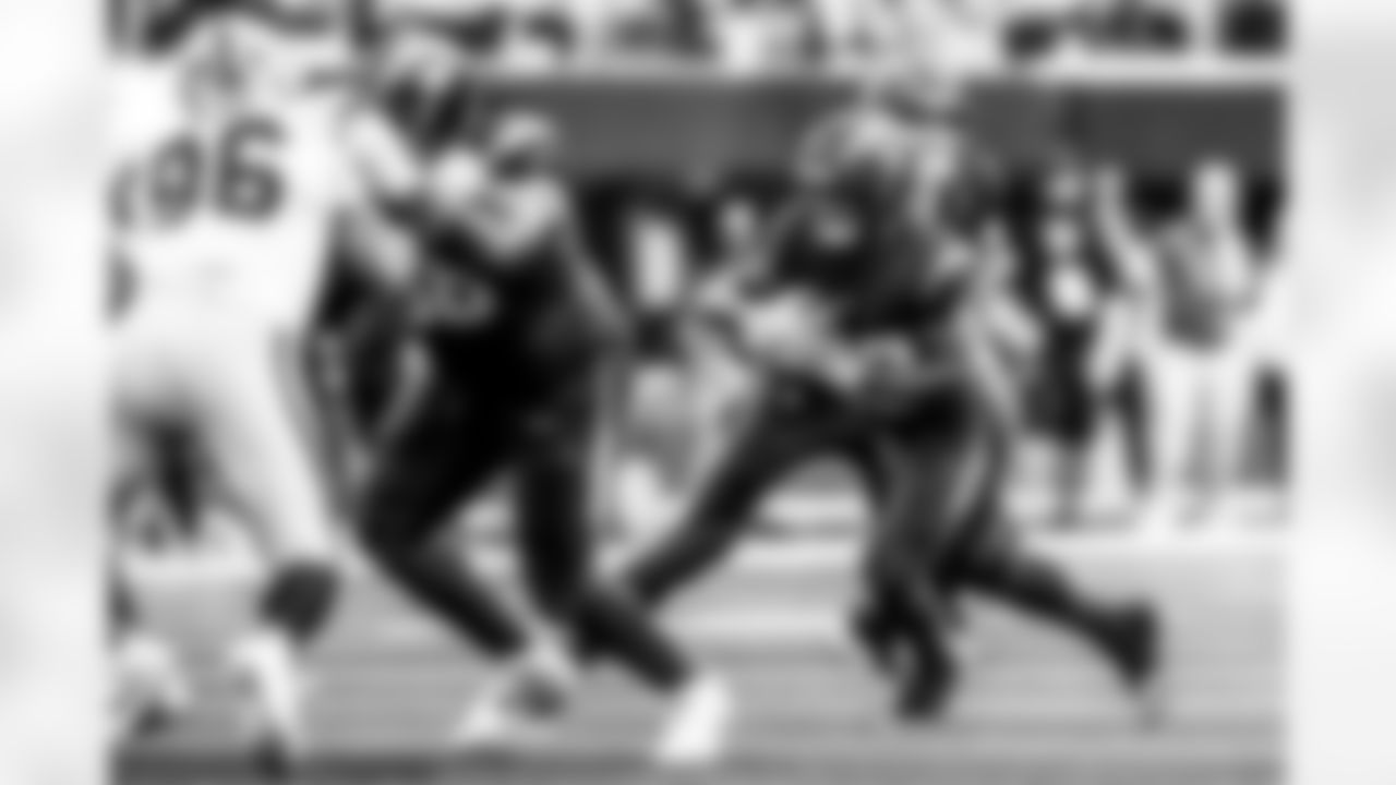 Take a look back at the Chargers Week 13 matchup with the Raiders in monochrome.