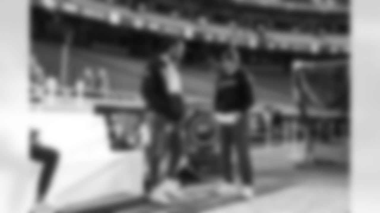 WR Quentin Johnston (1) and Wide Receivers Coach Sanjay Lal