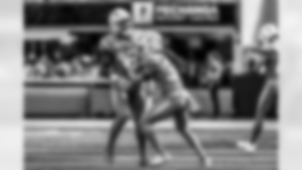 Take a look back at the Chargers Week 5 matchup with the Commanders in monochrome!