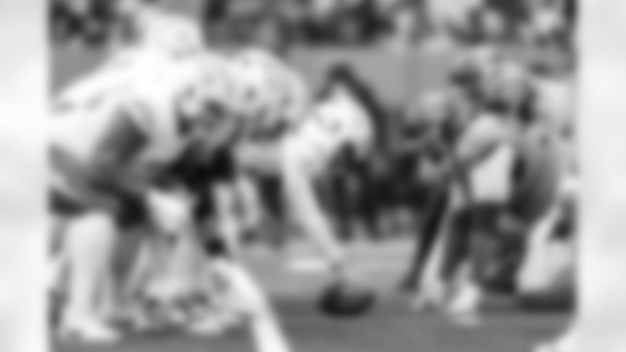 OL Foster Sarell (67) and LS Rick Lovato (41)