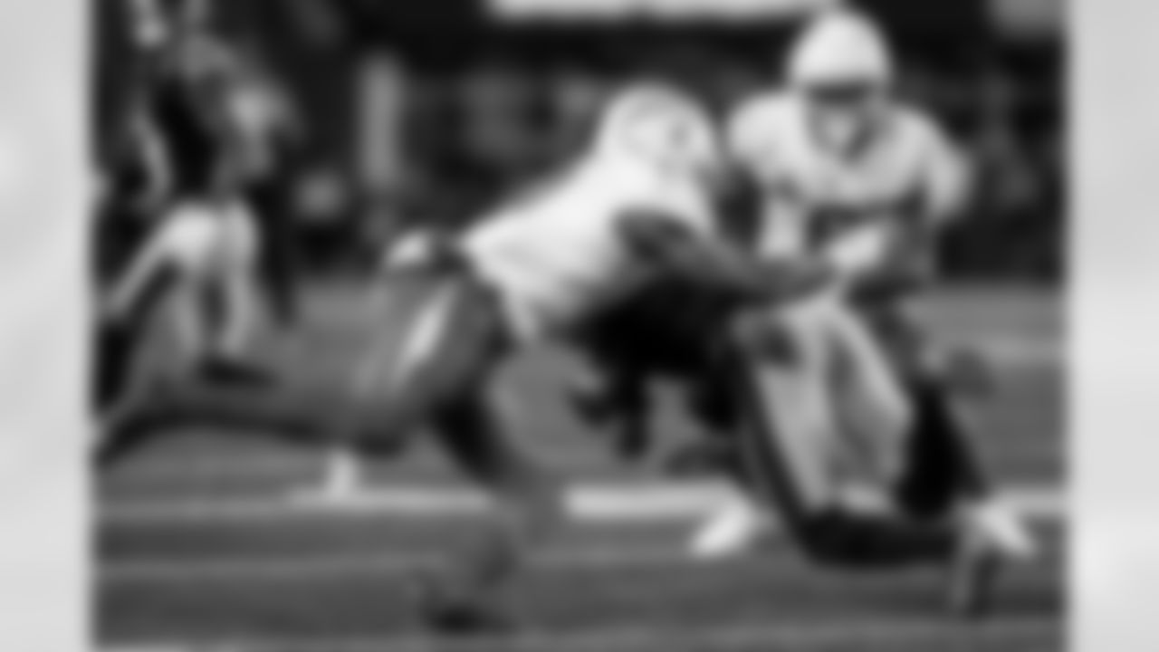 Check out the best shots from the Chargers Wild Card matchup against the Patriots!