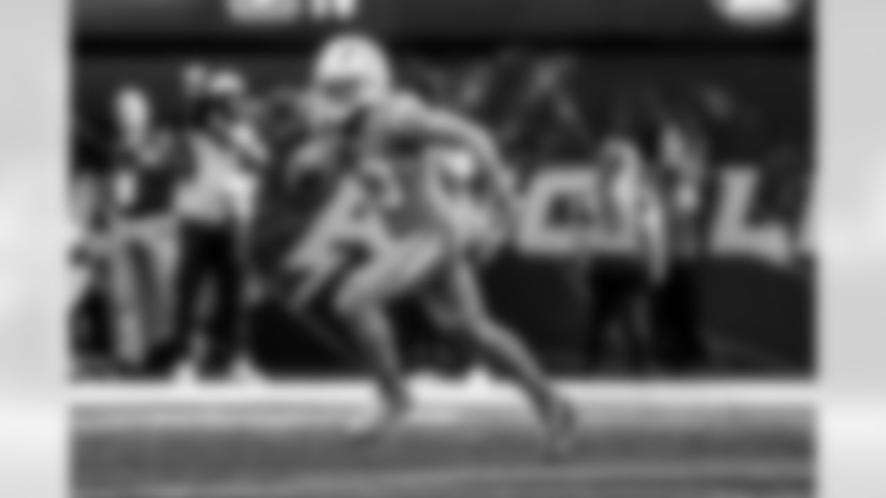 Take a look back at the Chargers Week 5 matchup with the Commanders in monochrome!