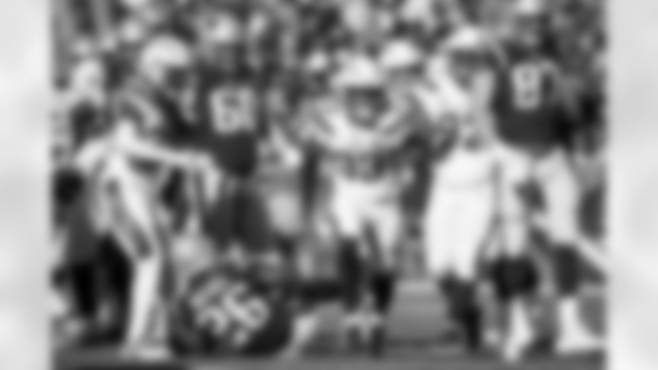 Relive the Chargers' postseason appearances through images from playoff games, highlighting the moments that defined the team in the NFL playoffs.