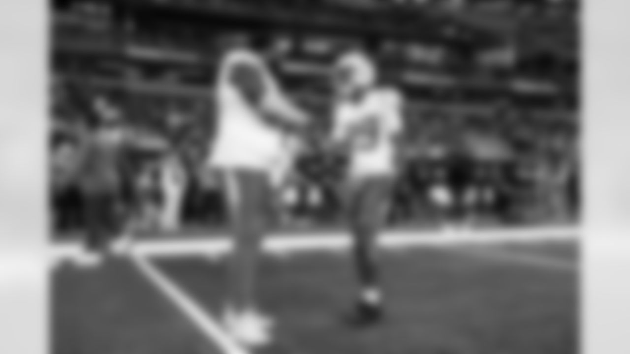 DL Teair Tart (90) and CB Tarheeb Still (29)