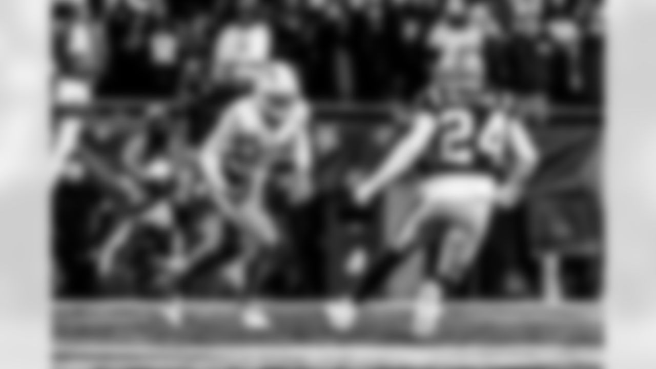 Take a look back at the Chargers Wild Card matchup with the Patriots in monochrome.