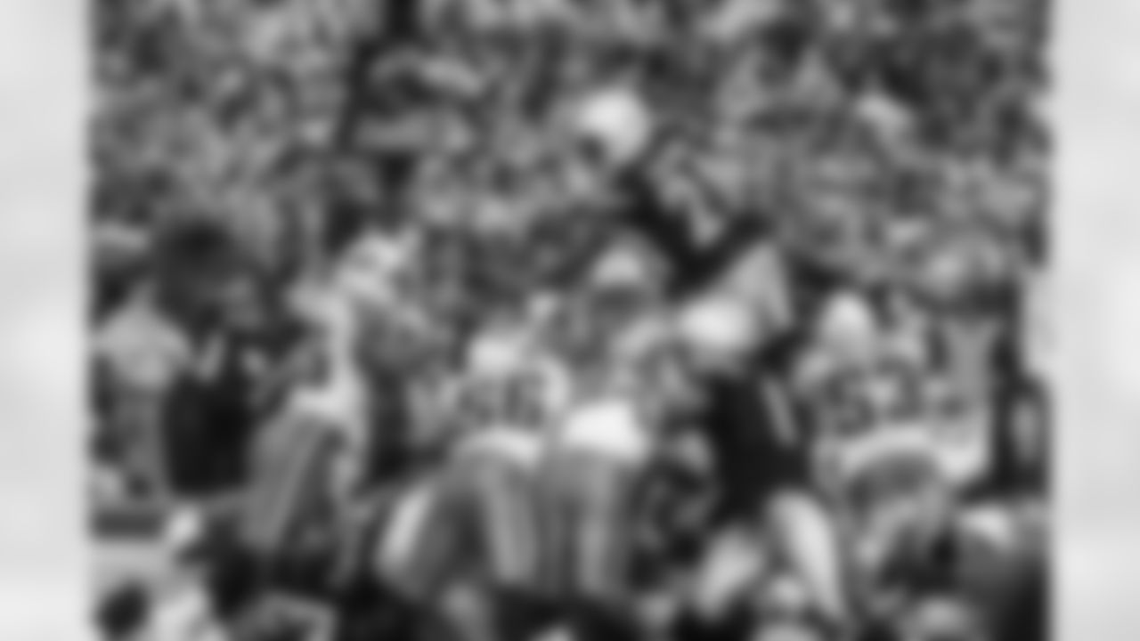 Relive the Chargers' postseason appearances through images from playoff games, highlighting the moments that defined the team in the NFL playoffs.