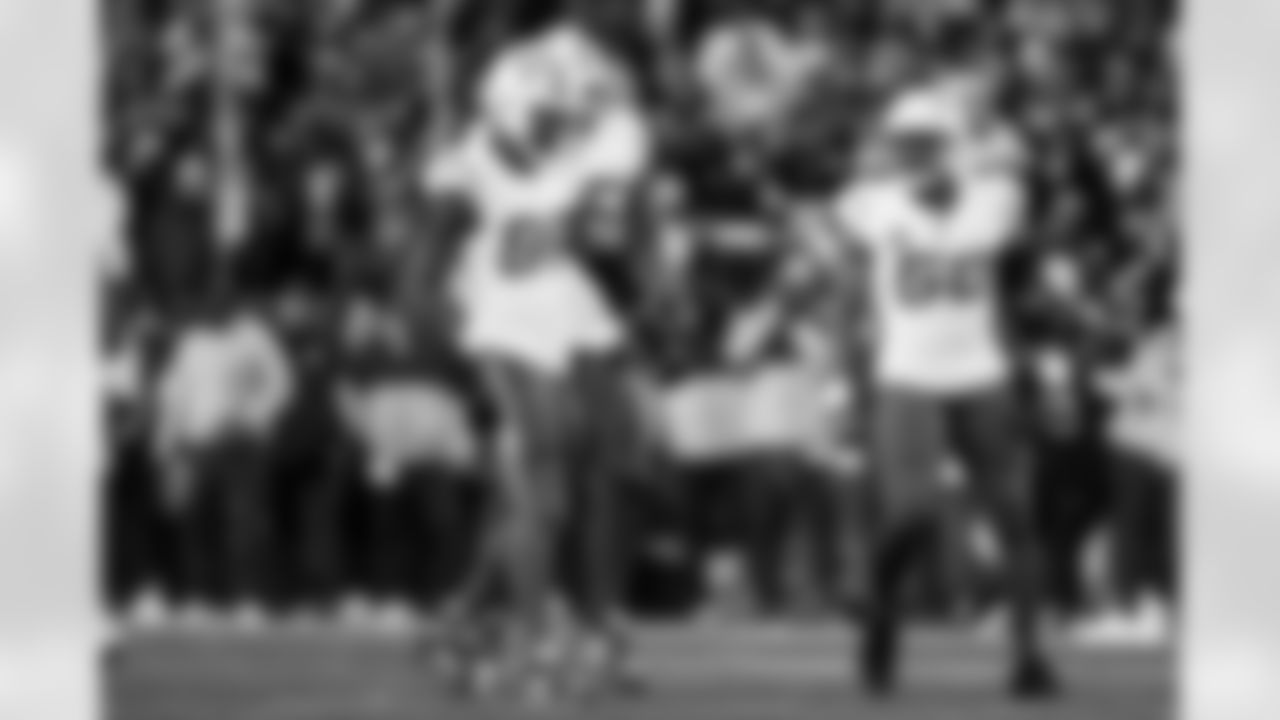 OLB Odafe Oweh (98) and OLB Khalil Mack (52)