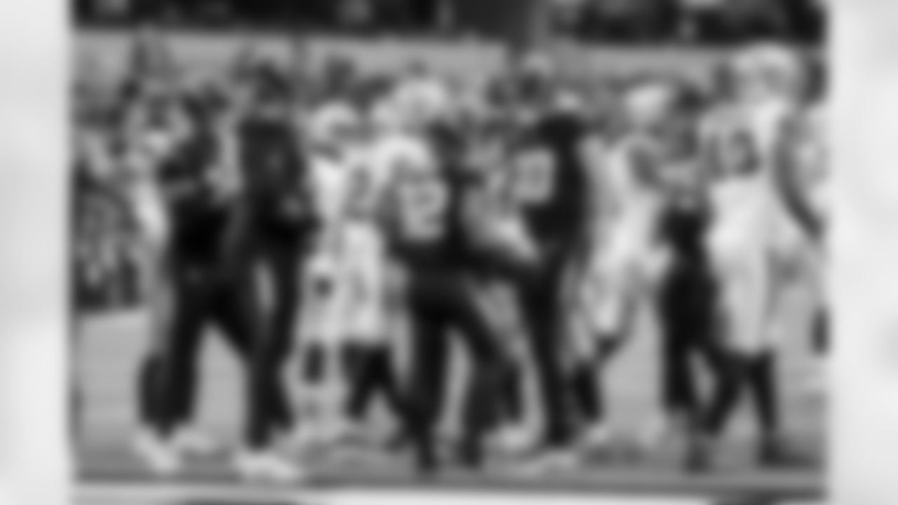 RB Jaret Patterson (32) and QB Justin Herbert (10)