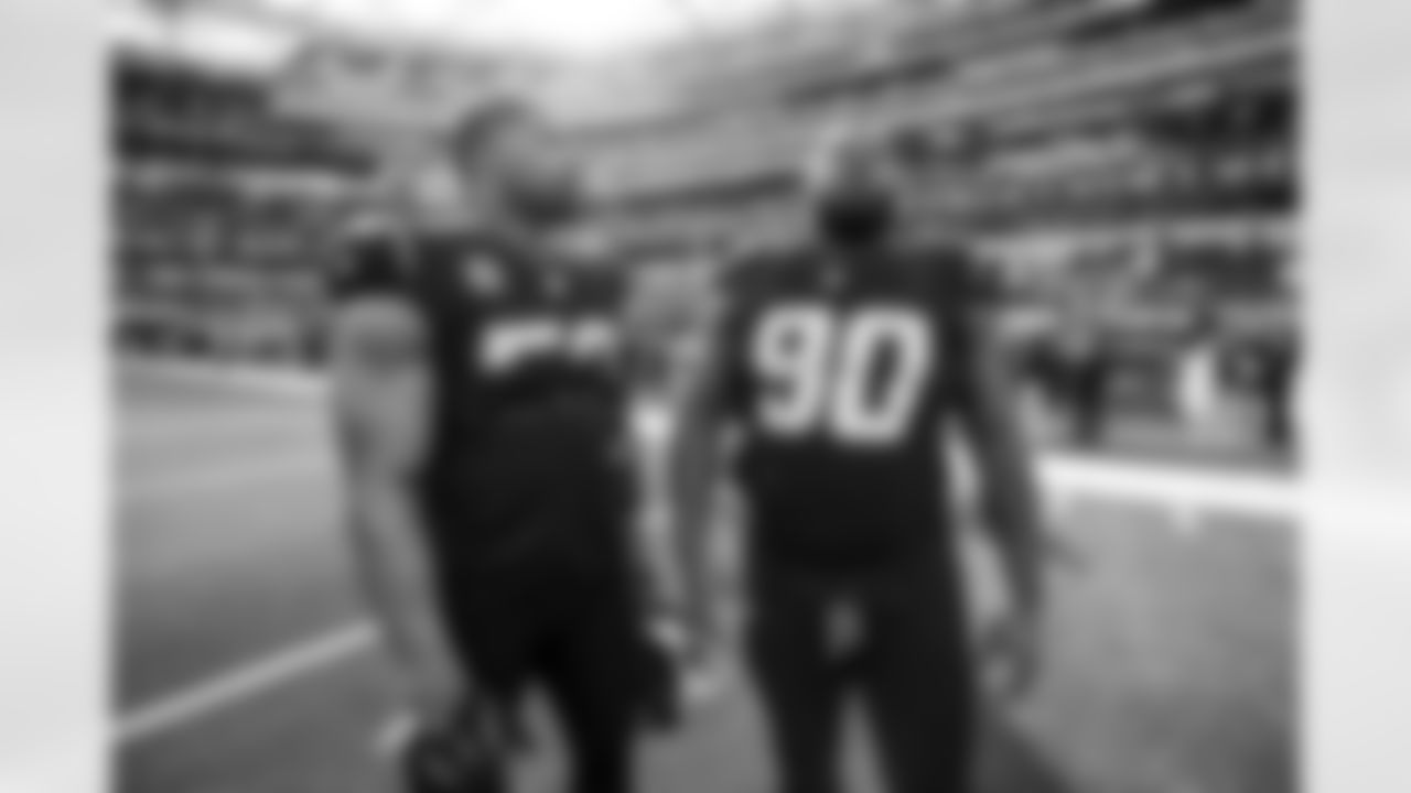 OLB Khalil Mack (52) and DL Teair Tart (90)