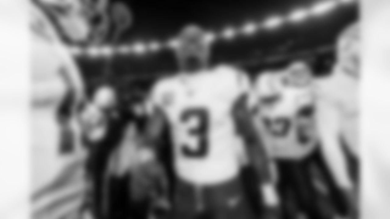 Check out the best shots from the Chargers Wild Card matchup against the Patriots!