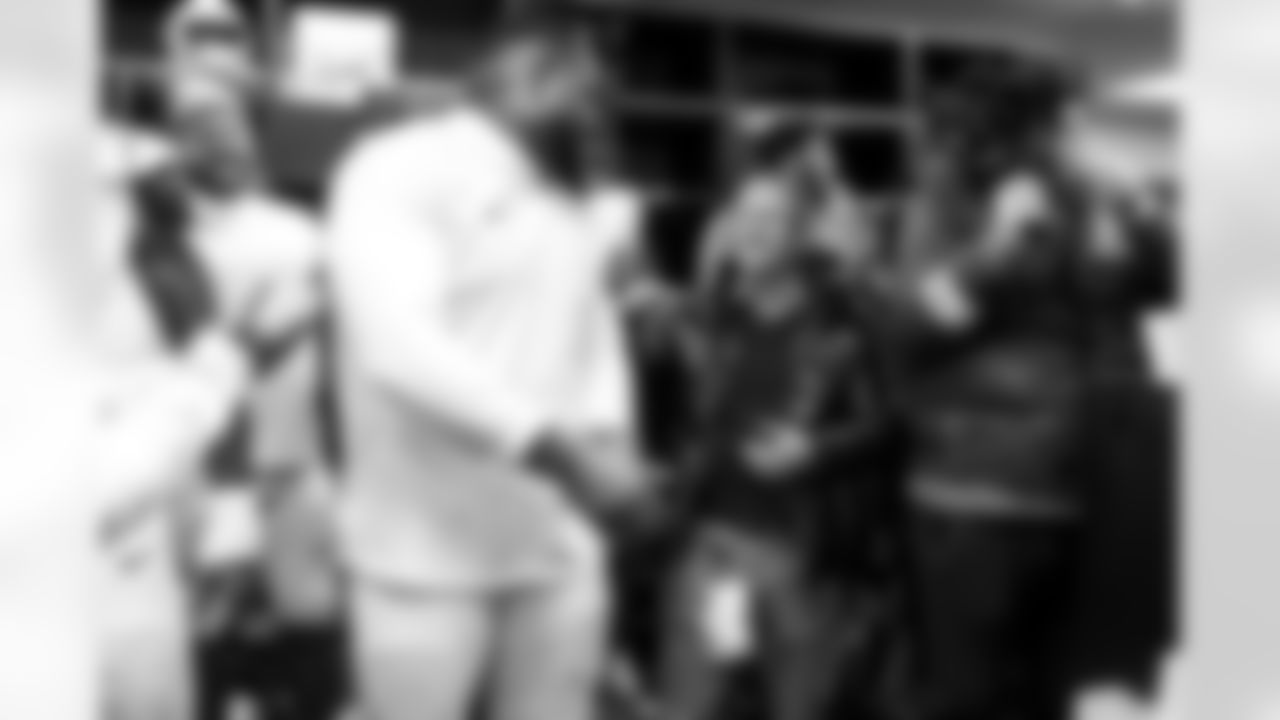 DL Da'Shawn Hand (91) and John Spanos