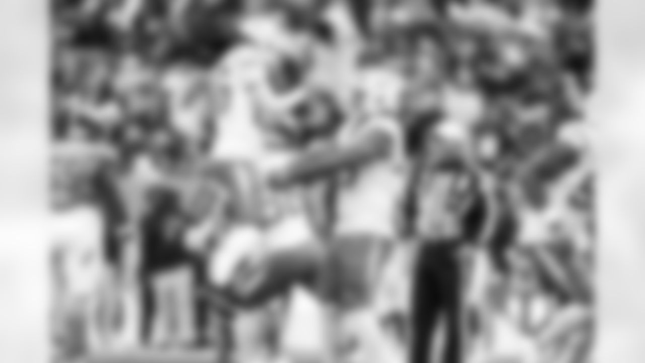 CB Donte Jackson (26) and OLB Tuli Tuipulotu (45)