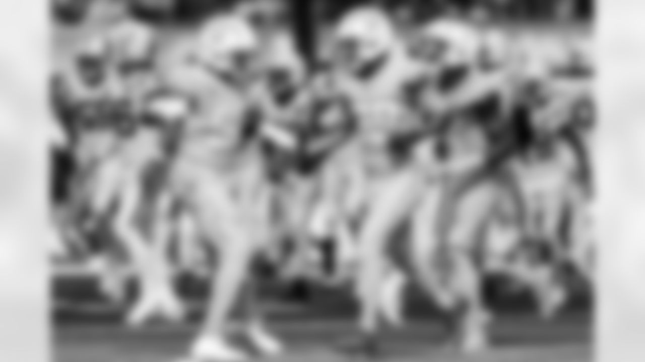 OLB Khalil Mack (52) and CB Tarheeb Still (29)