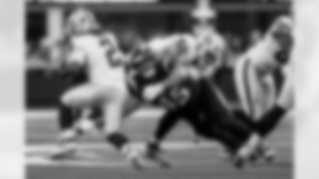 Chargers OLB Tuli Tuipulotu (#45) in action during their Pro Bowl season.