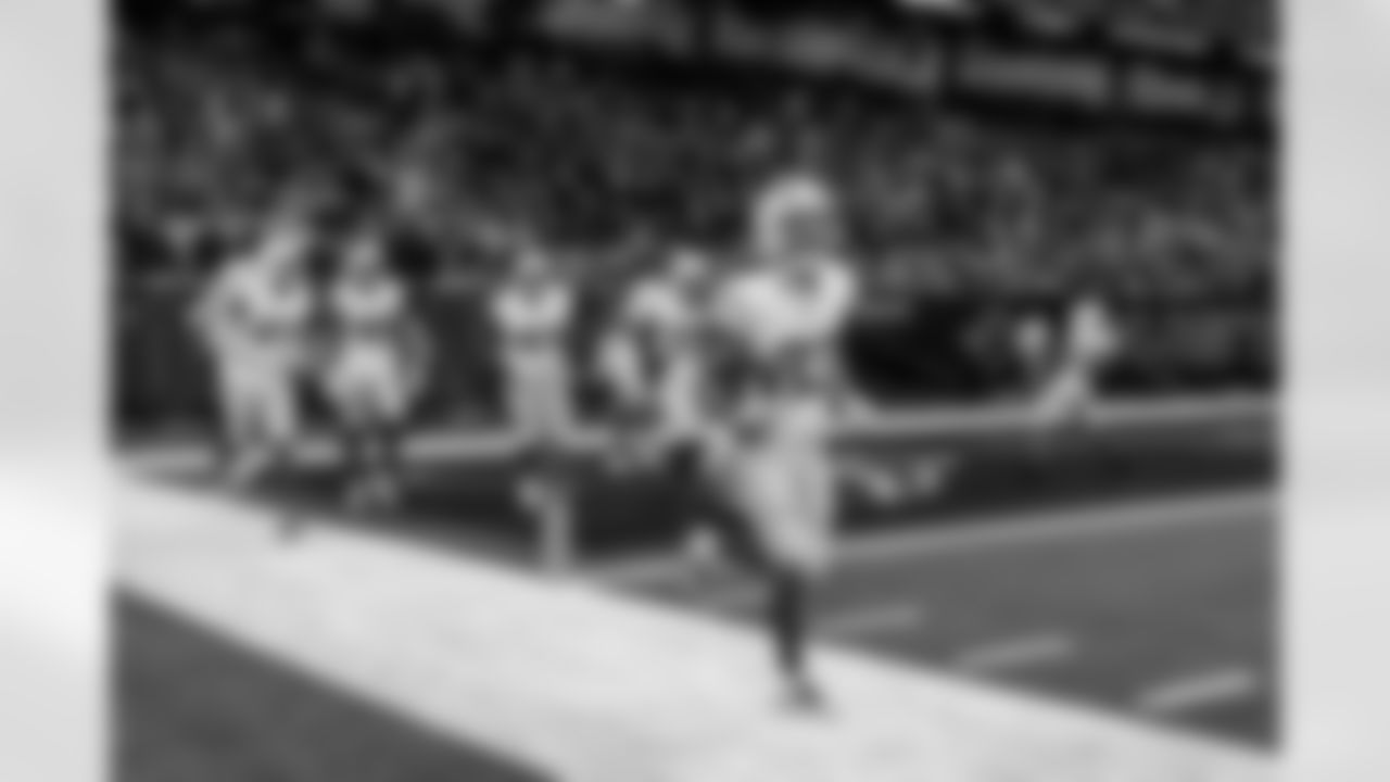 Check out the best shots from the Chargers Wild Card matchup against the Texans!