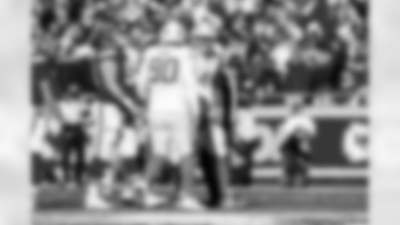 DL Teair Tart (90) and OLB Tuli Tuipulotu (45)