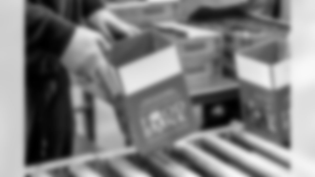 The Los Angeles Chargers participate in a SYNC Snack Box Packaging Event on Monday, June 2, 2025 at LA Regional Food Bank in Los Angeles, CA.