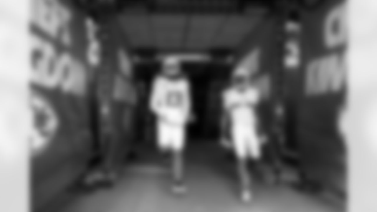 WR Keenan Allen (13) and WR Tre Harris (9)