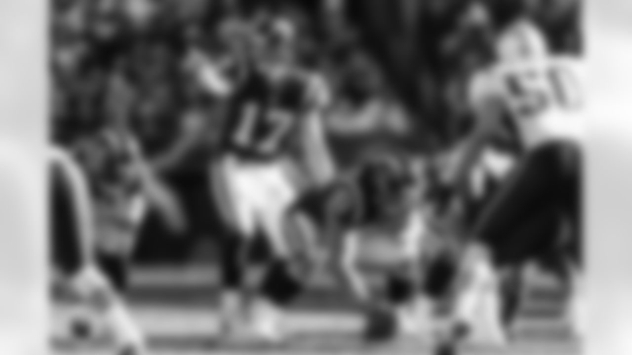 Relive the Chargers' postseason appearances through images from playoff games, highlighting the moments that defined the team in the NFL playoffs.