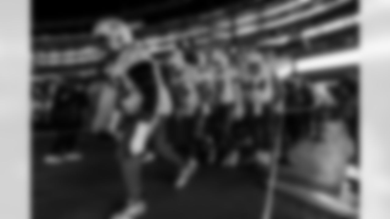 Check out the best shots from the Chargers Wild Card matchup against the Patriots!