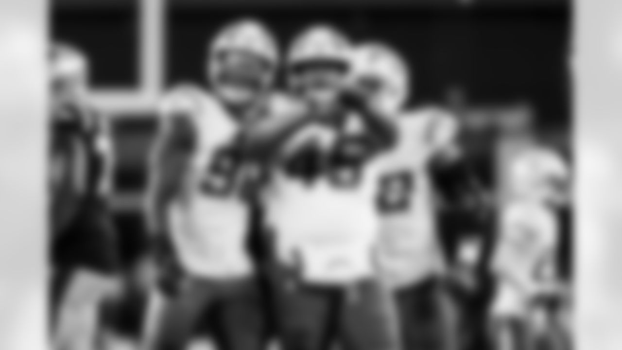 OLB Odafe Oweh (98), OLB Tuli Tuipulotu (45) and OLB Khalil Mack (52)