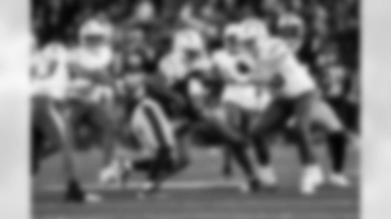 WR Tre Harris (9) and TE Will Dissly (89)