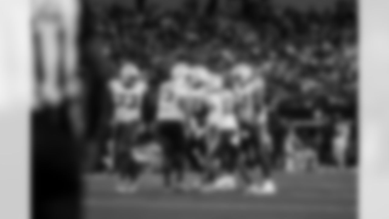 C Bradley Bozeman (75) and QB Justin Herbert (10)