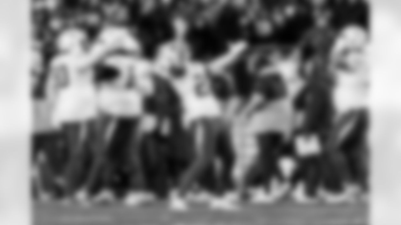 Check out the best shots from the Chargers Wild Card matchup against the Patriots!